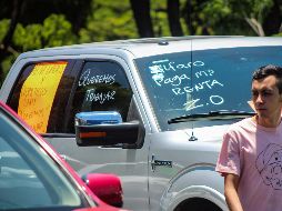 La caravana de autos de los comerciantes se trasladó hacia La Minerva para hacer más visible su manifestación. EL INFORMADOR / E. BARRERA