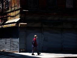 Negocios cerrados en una calle de Nueva York. Los analistas calculan que, sumando todos los programas de prestaciones por desempleo, el paro llega a casi el 18% de la fuerza laboral. EFE/J. Lane
