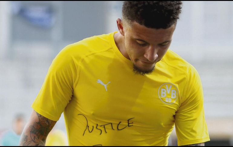 APOYO. Jadon Sancho, del Dortmund, se sumó. EFE