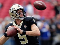 ''Nunca voy a coincidir en opinión con alguien que le falte el respeto a la bandera de Estados Unidos o a nuestro país'', sentenció Brees en entrevista con Yahoo. AFP / ARCHIVO