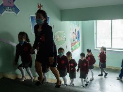 Dos adultos sufrieron heridas más graves, pero ninguna víctima corre peligro de muerte. AFP/W. Kim