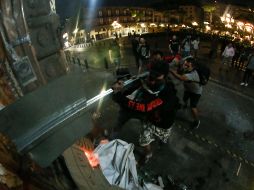 Unas setecientas personas se congregaron frente a Palacio de Gobierno, al terminar la manifestación, una veintena regresó para causar destrozos. EL INFORMADOR/G. Gallo