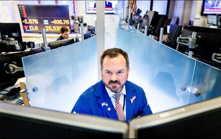 Por sectores, lideraron el alza de hoy las empresas energéticas, de servicios públicos, inmobiliarias e industriales. EFE/J. Lane