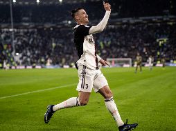 Cristiano Ronaldo fue clave en el partido de ida, consiguiendo de penal, en los últimos minutos, el empate en San Siro. AFP / ARCHIVO