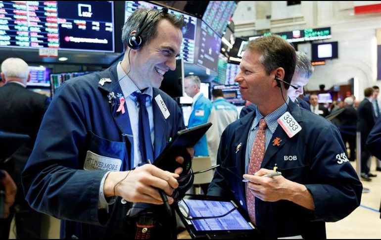 Por sectores, las ganancias estuvieron encabezadas por el inmobiliario, el financiero y el energético. EFE/J. Lane