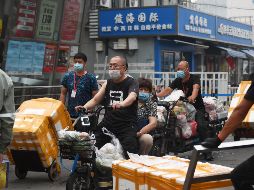 Hasta el momento, siete casos han sido relacionados con un mercado local de carne llamado Xinfadi, seis de ellos confirmados este sábado. FP / G. Baker