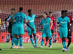 El Barcelona goleó 4-0 en el campo del Mallorca (18) este sábado en su regreso a la competición tras la pandemia en la 28ª jornada liguera. AFP / J. Reina