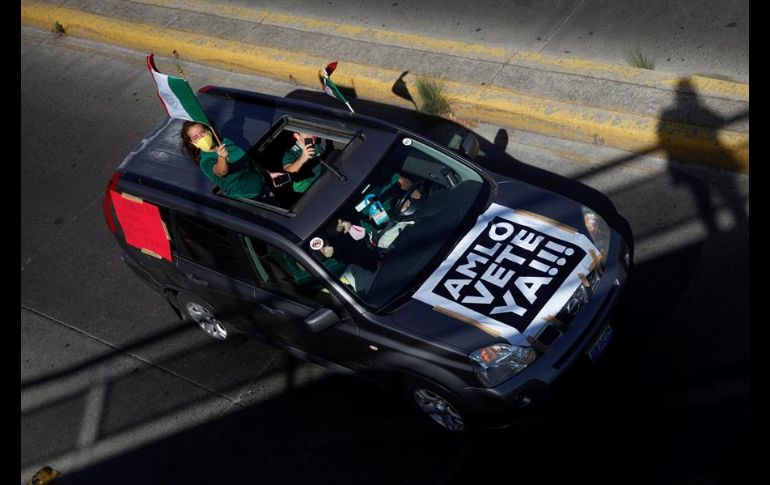 La caravana recorrió varios kilómetros de las principales avenidas de Guadalajara, donde se observaron unos dos mil automóviles. EFE/F. Guasco
