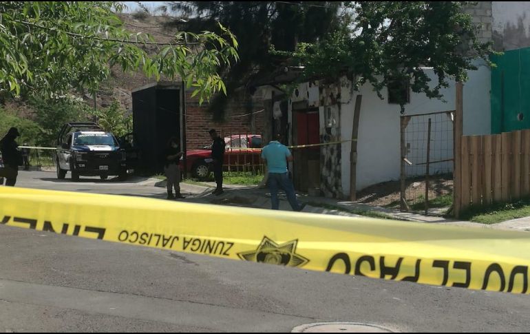 En el cruce de las calles Flor de Ciruelo y Orquídea, en Tlajomulco, se localizaron dos bolsas con restos humanos. ESPECIAL