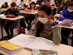 En un principio, se pensó que el nuevo coronavirus podía ser altamente contagioso entre los niños, como lo es por ejemplo el virus de la gripe. AFP / T. Samson