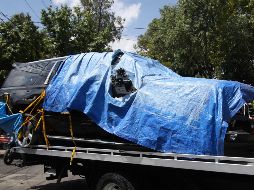 Imagen de la camioneta del secretario Omar García Harfuch luego del ataque de esta mañana y antes de ingresar a la Fiscalía Antisecuestro de la CDMX en Azcapotzalco. SUN / C. Mejía