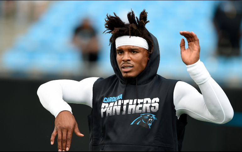 Newton, quien fue liberado por los Carolina Panthers en marzo, pasó un examen médico y busca reconstruir su carrera bajo el entrenador en jefe de los Patriots, Bill Belichick. AP