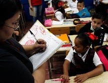 La SEJ recuerda que para adquirir la boleta y el certificado escolar, los padres de familia pueden ingresar al sitio oficial de Recrea Digital. EL INFORMADOR/ARCHIVO