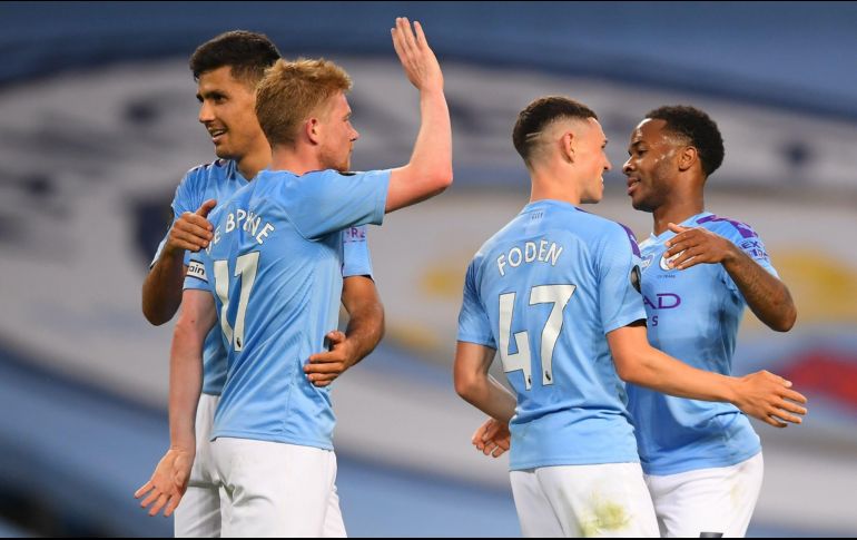 La goleada sirve para reconfortar al City tras el título de liga perdido y acomoda a los de Guardiola en la segunda plaza, con once puntos de ventaja sobre el Leicester City, tercero. AFP / L. Griffiths