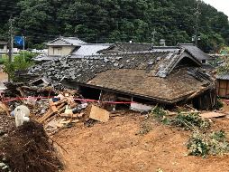 Una vivienda colapsada tras un deslave en  Ashikita, en la prefectura de  Kumamoto. AFP/JIJI PRESS