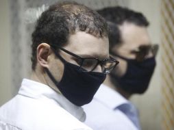 Los hermanos Luis Enrique y Ricardo Alberto Martinelli Linares permanecen detenidos en la Torre de Tribunales este lunes en Ciudad de Guatemala. EFE/ Esteban Biba