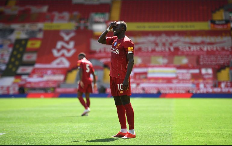 Los de Jürgen Klopp necesitarán ganar los tres encuentros que le quedan para poder superar los 100 puntos que marcó el Manchester City en la temporada 2017-2018. AFP / O. Scarff