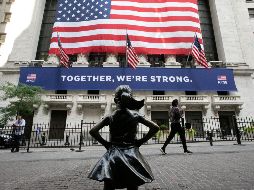 Al cierre de las operaciones en la Bolsa de Nueva York, el Dow aumentó 378.13 puntos. AP/ARCHIVO