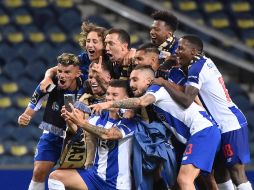 Con todavía dos jornadas por delante, los Dragones ya son inalcanzables en la clasificación para el único rival que les disputaba las aspiraciones al título, el Benfica. AFP / M. Riopa