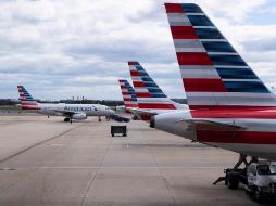 Aviones de American Airlines estacionados en la pista del Aeropuerto Nacional Ronald Reagan en Arlington, Virginia. EFE/ARCHIVO