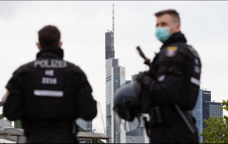 Cinco oficiales resultaron heridos en los disturbios que se iniciaron a las tres de la madrugada. AFP / ARCHIVO
