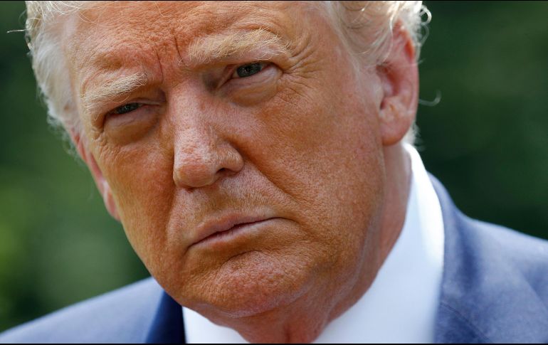 Trump insiste en que las encuestas que lo muestran rezagado frente a Biden son defectuosas. AP / ARCHIVO