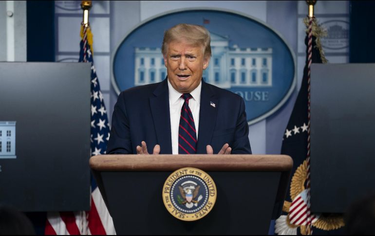 El mandatario espera que en el regreso de las Grandes Ligas, la NBA y la NFL lo hagan sin protestas durante el himno. AP / E. Vucci