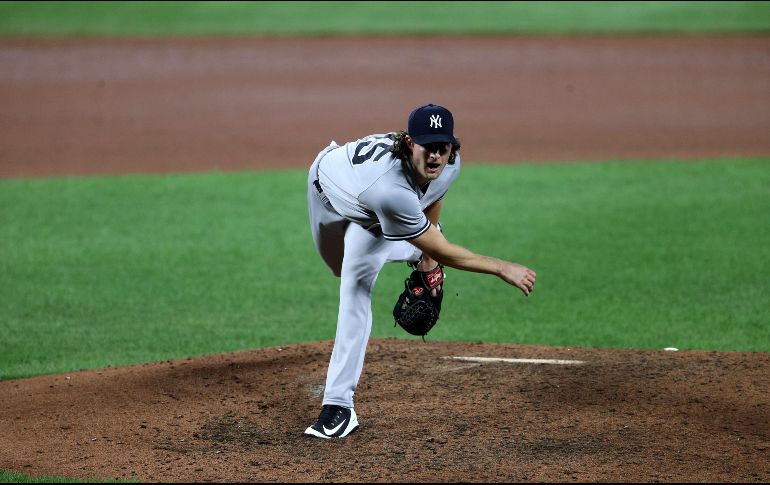 Cole (2-0) lanzó seis episodios y dos tercios, aceptando cuatro imparables, jonrón y tres carreras. AFP / R. Carr