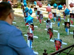 Vista de varias fotografías de los niños fallecidos en la guardería ABC en el año 2009, durante un homenaje realizado en un parque de la ciudad de Hermosillo, Sonora. EFE/ARCHIVO