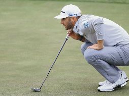 LÍDER. Dustin Johnson busca que no se repita la historia de hace 10 años. AFP • J. Squire