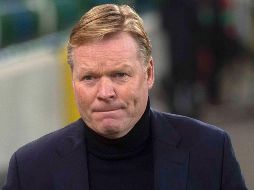 El exdefensa holandés cumple así su sueño de regresar al club azulgrana para dirigir al primer equipo. AFP