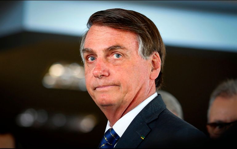 Periodistas cuestionaron la amenaza, pero Bolsonaro se fue sin comentar nada más. AFP/ARCHIVO