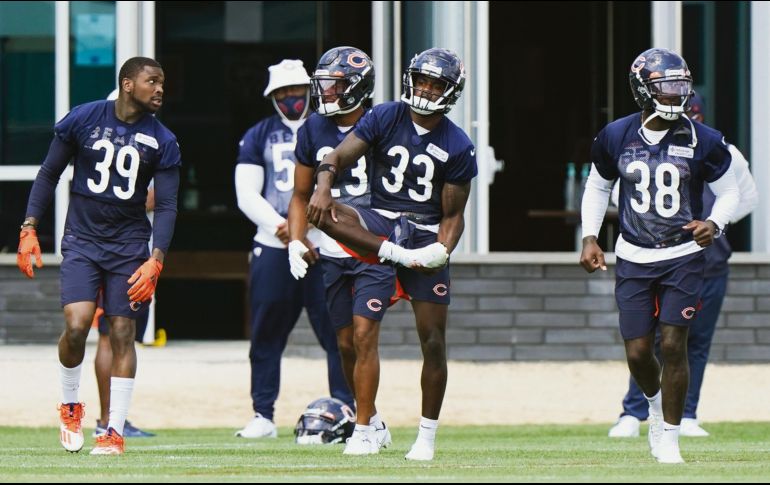 ALERTAS. Nueve jugadores de los Bears de Chicago estuvieron entre los afectados; el equipo cambió su programación de ayer. AP• N. Huh