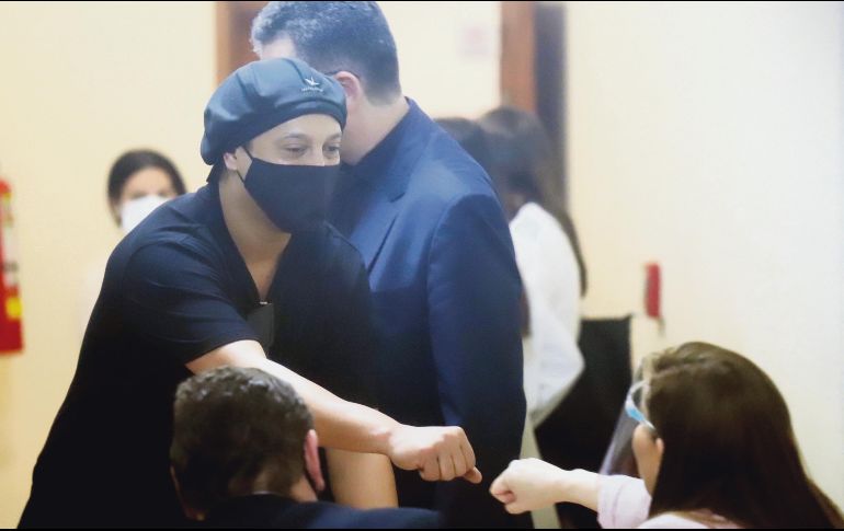 SONRIENTE. Pese al cubrebocas, se notó al brasileño sonriente y de buen humor en la audiencia de ayer. EFE