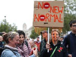 Británicos muestran solidaridad con las marchas en Alemania contra el uso de mascarillas. AP/Y. Mok