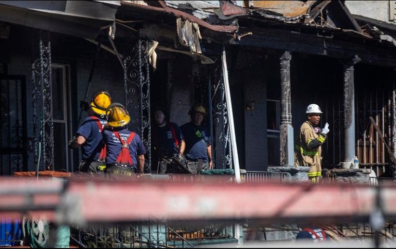 Una mujer de 35 años fue encontrada en la planta baja, mientras que sus tres hijos fueron encontrados arriba. AP/T. Williams-The Philadelphia Inquirer