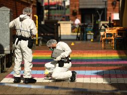 Forenses trabajan en la zona de una de las agresiones en Birmingham. AFP/O. Scarff