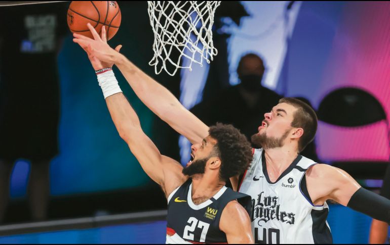 MUCHO CORAZÓN. Los Nuggets llegarón a ir perdiendo por 16 puntos y terminaron ganando por 13. AP