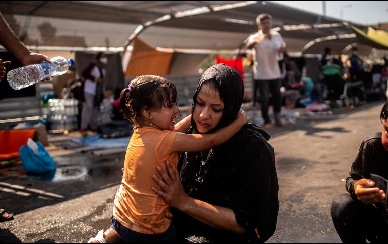 Alrededor de 12 mil migrantes del campo de Moria se encuentran sin refugio desde el incendio y duermen en edificios abandonados. AFP / ARCHIVO