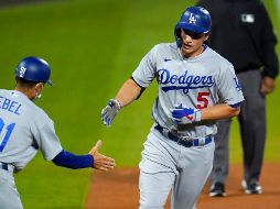 El campocorto Corey Seager consiguió tres imparables, incluido un cuadrangular, en la victoria de los angelinos 9-3 sobre Colorado. AP / D. Zalubowski