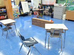 Cada escuela podrá recibir hasta 150 mil pesos. AFP/M. Loccisano