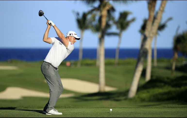 Adam Long firmó ayer una tarjeta de 64 golpes. AFP/A. Lyons