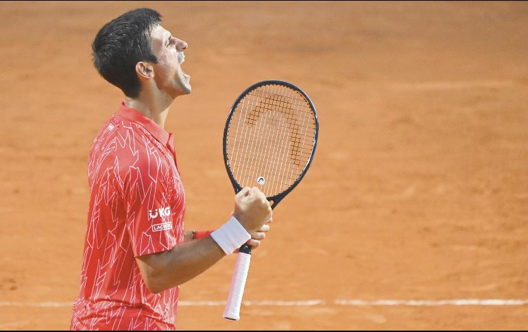 Djokovic afirma que ha dado negativo a COVID-19 en numerosas ocasiones. AFP/R. Antimiani