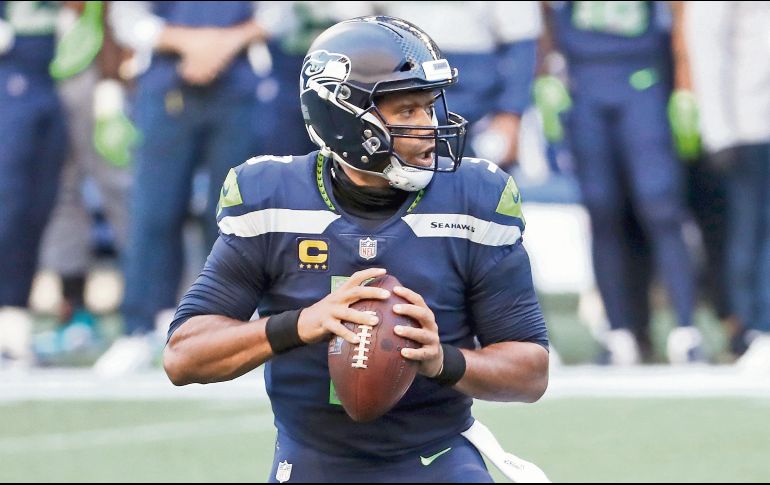 Russell Wilson acumula nueve pases de anotación tras dos juegos celebrados. AFP/A. Parr