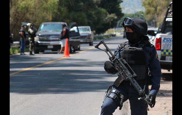 Policías resguardan el sito del ataque. EFE