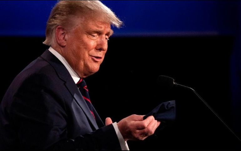 Trump dijo que Biden usaba el cubrebocas “más grande que haya visto”. AFP / ARCHIVO