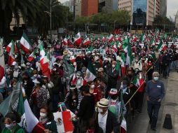 Elementos de la Secretaría de Seguridad Ciudadana vigilan el desarrollo de la marcha. SUN/C. Mejía