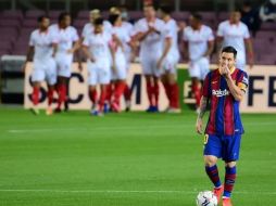 Messi colaboró en el gol de Coutinho para el empate, pero no fue suficiente para sacar el triunfo ante el Sevilla. AFP / L. Gene