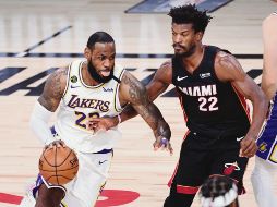 FÉRREO. LeBron James y Jimmy Butler han sacado la casta por sus respectivos equipos. AFP / D. Defelice