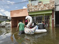 ESTRAGOS. El pasado fin de semana, la tormenta tropical “Gamma” obligó a miles de personas a evacuar sus hogares en Tabasco y Chiapas. EFE